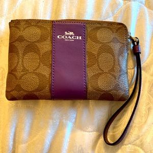 Coach small wristlet.  Never used.  Brown and plum.